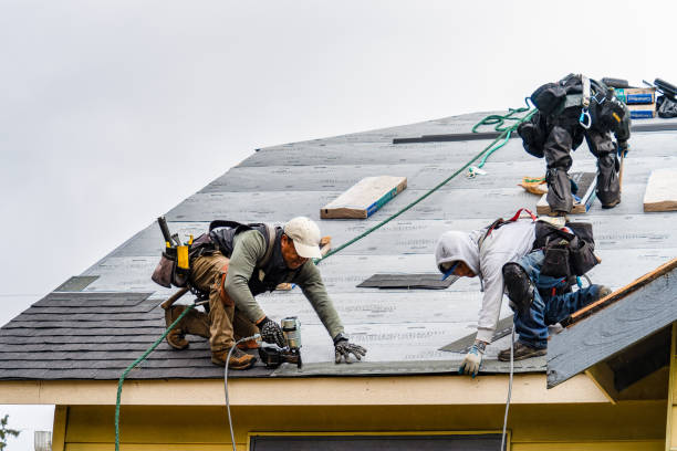 Professional Gutter Installation technician working in Butler, IN